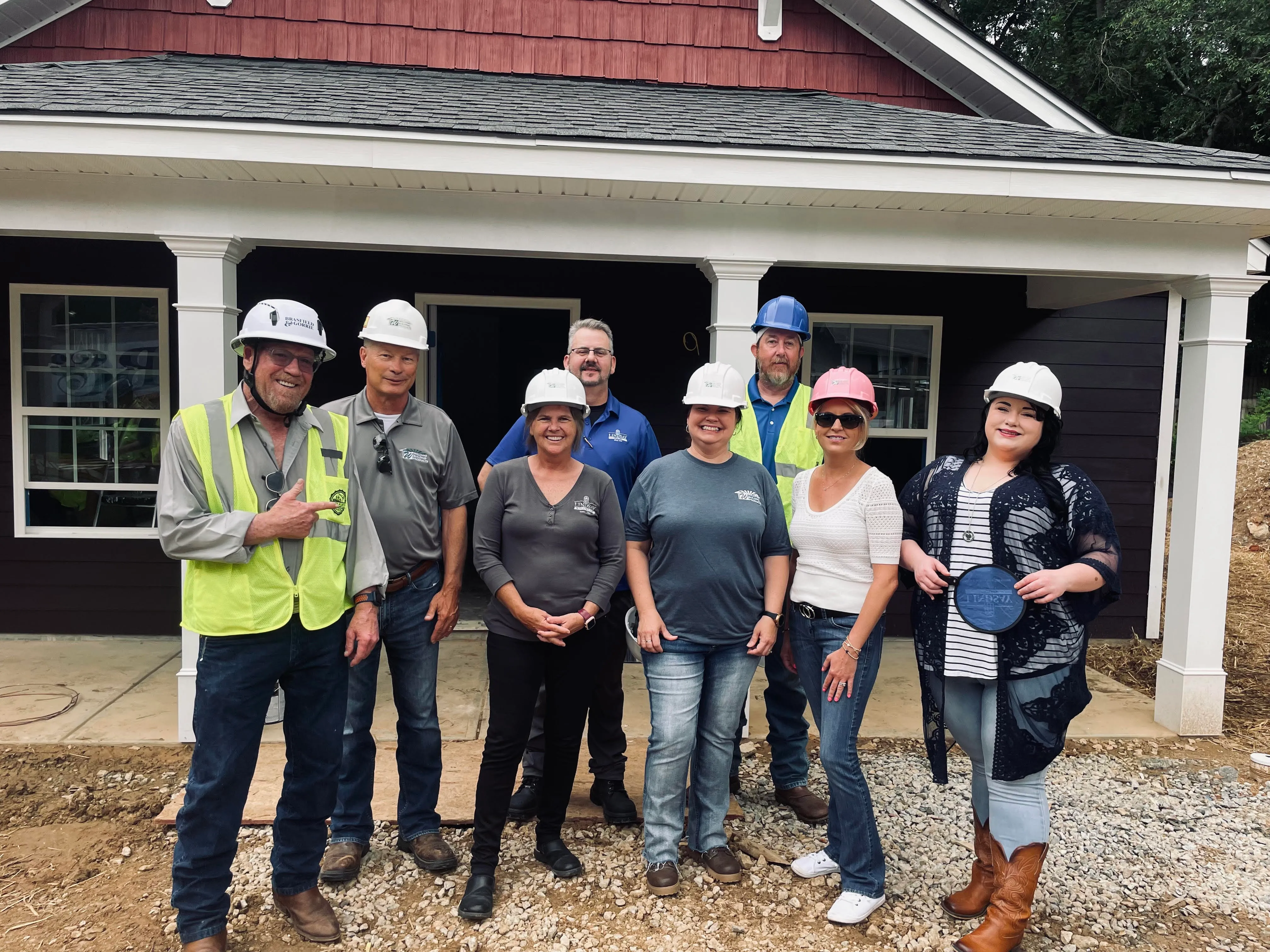 The Williams Building Products team in hard hats at a Habitat for Humanity build